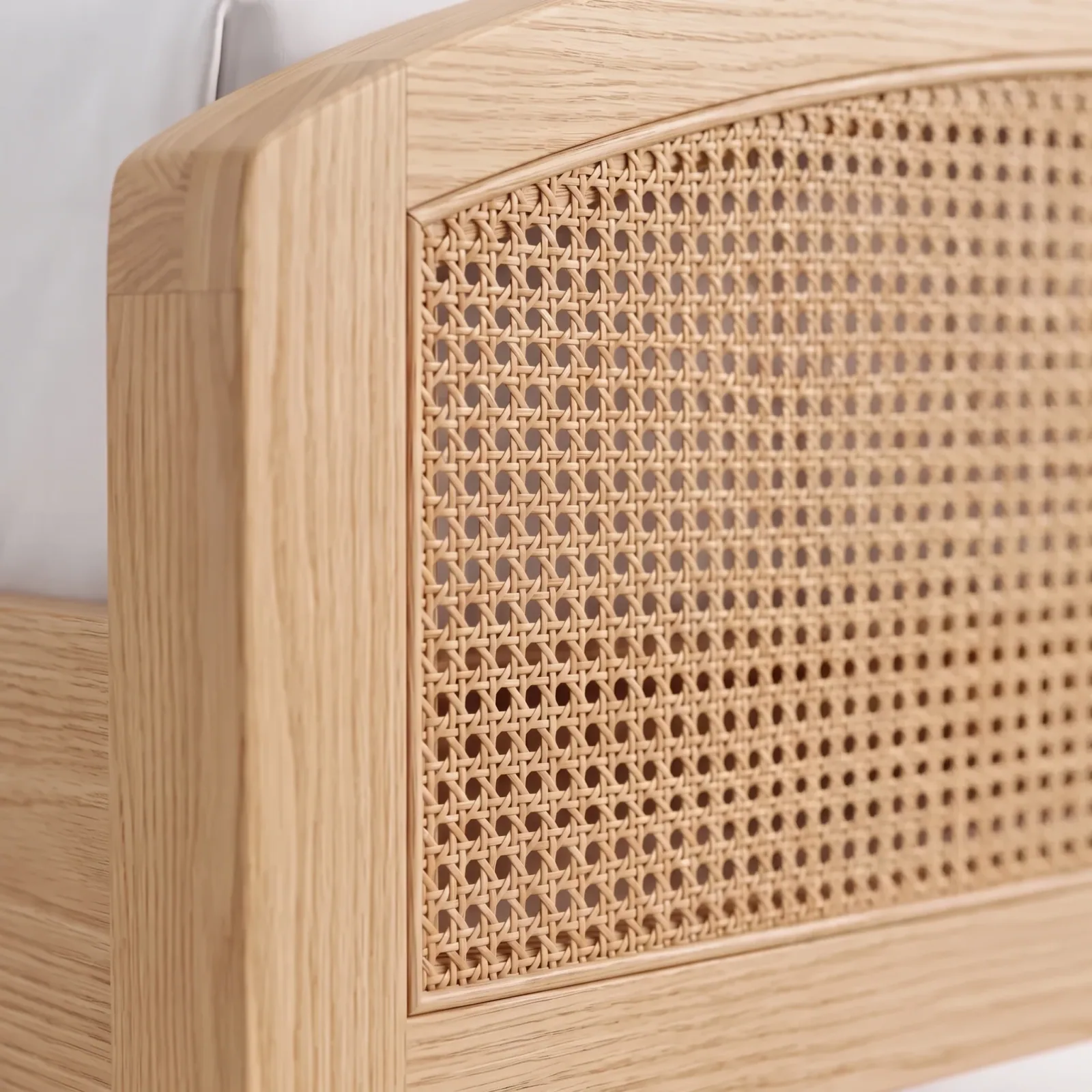 Woven cane panel and oak frame — material close-up