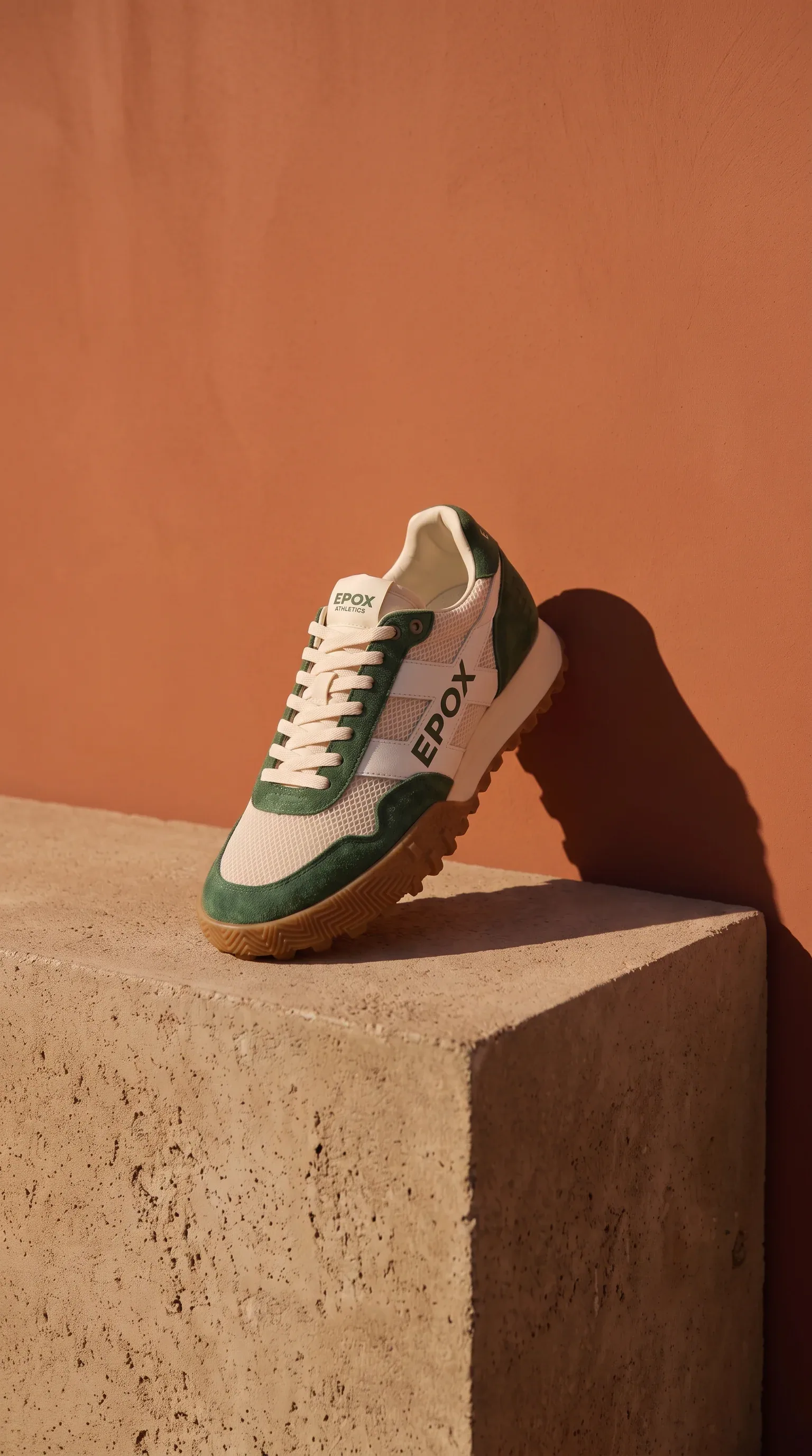 The square sneaker ad reframed to 9:16, wall and plinth extended
