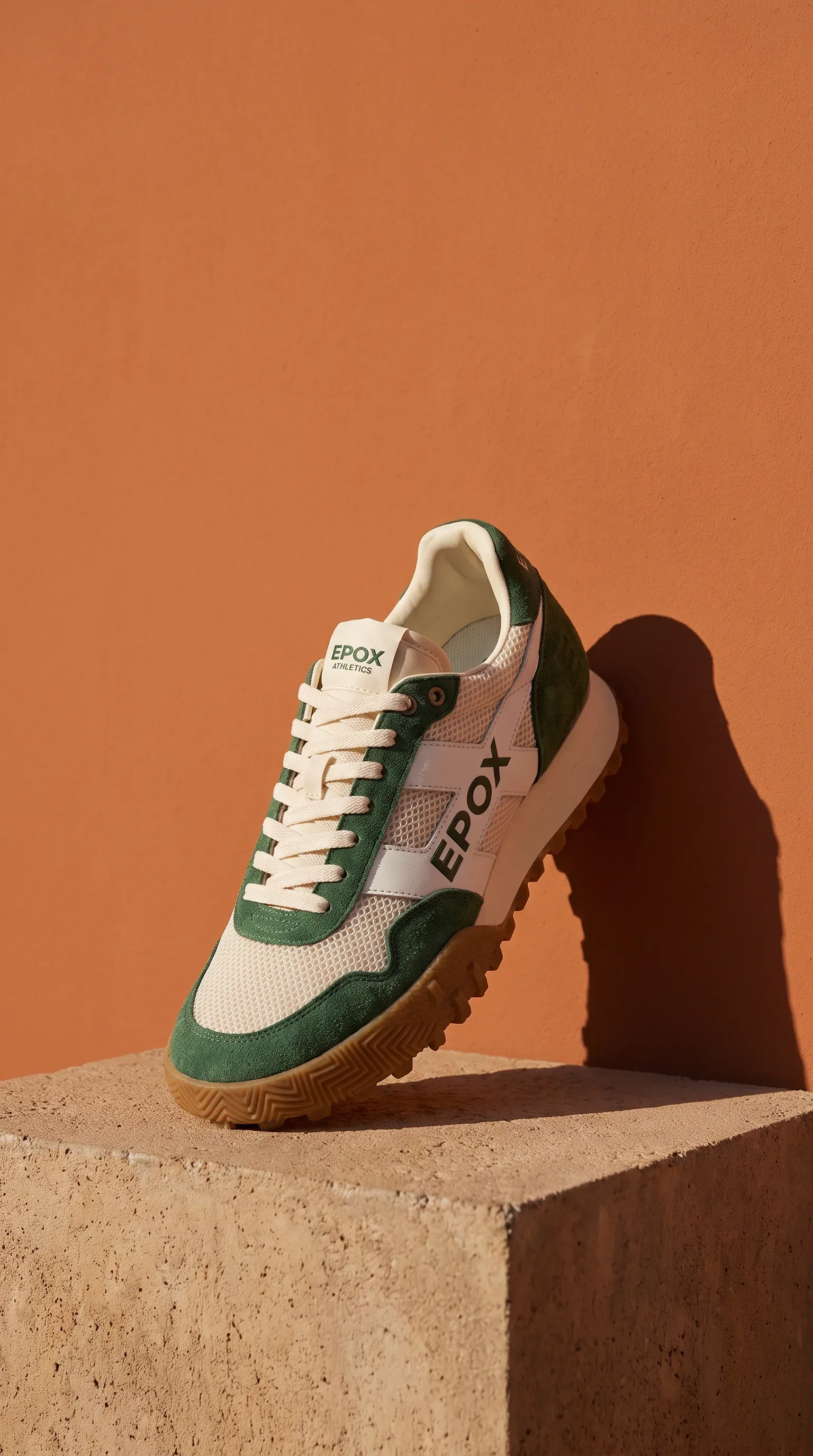 Suede runner sneaker on a plinth, vertical story ad